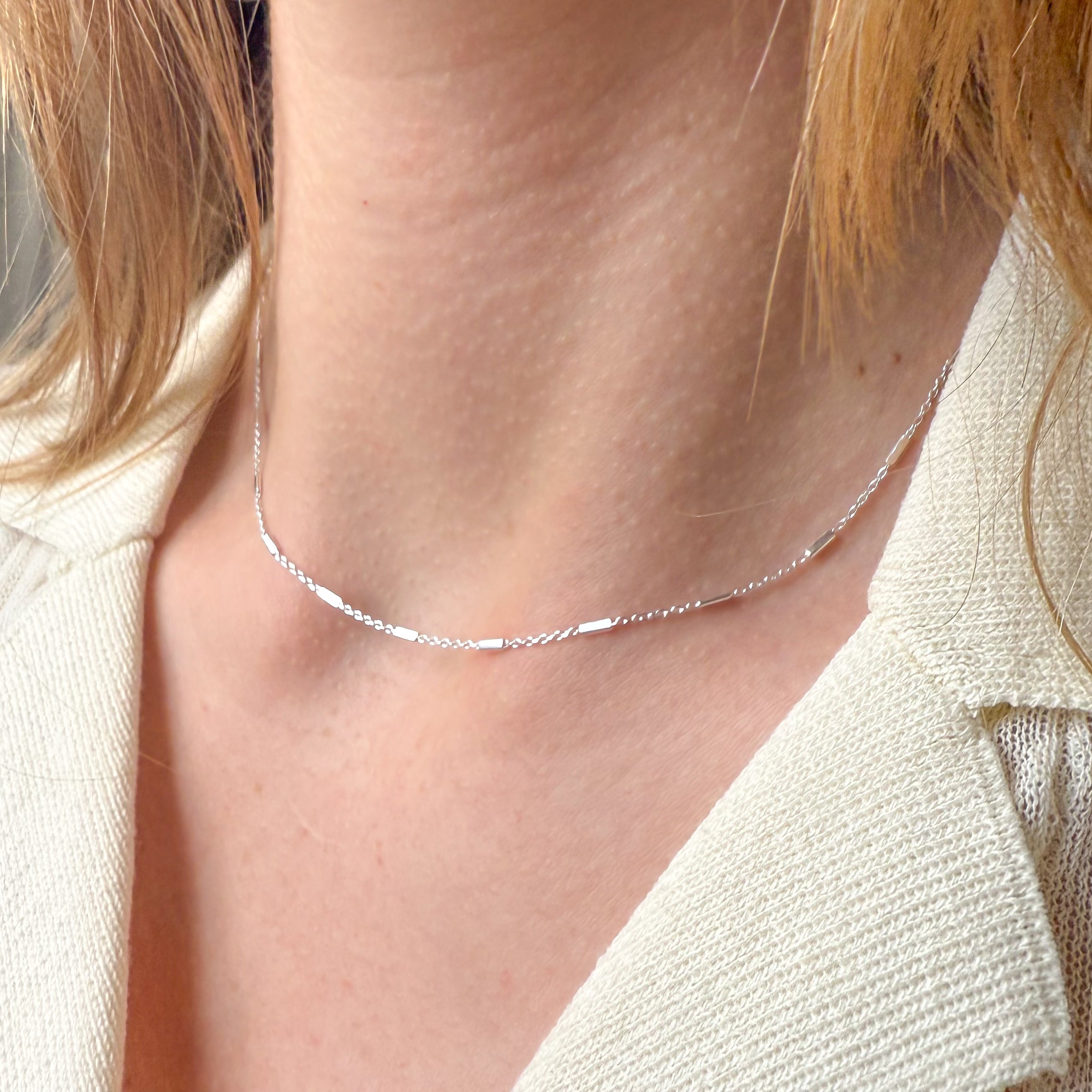 Vågring och kabel i silverfärgat set