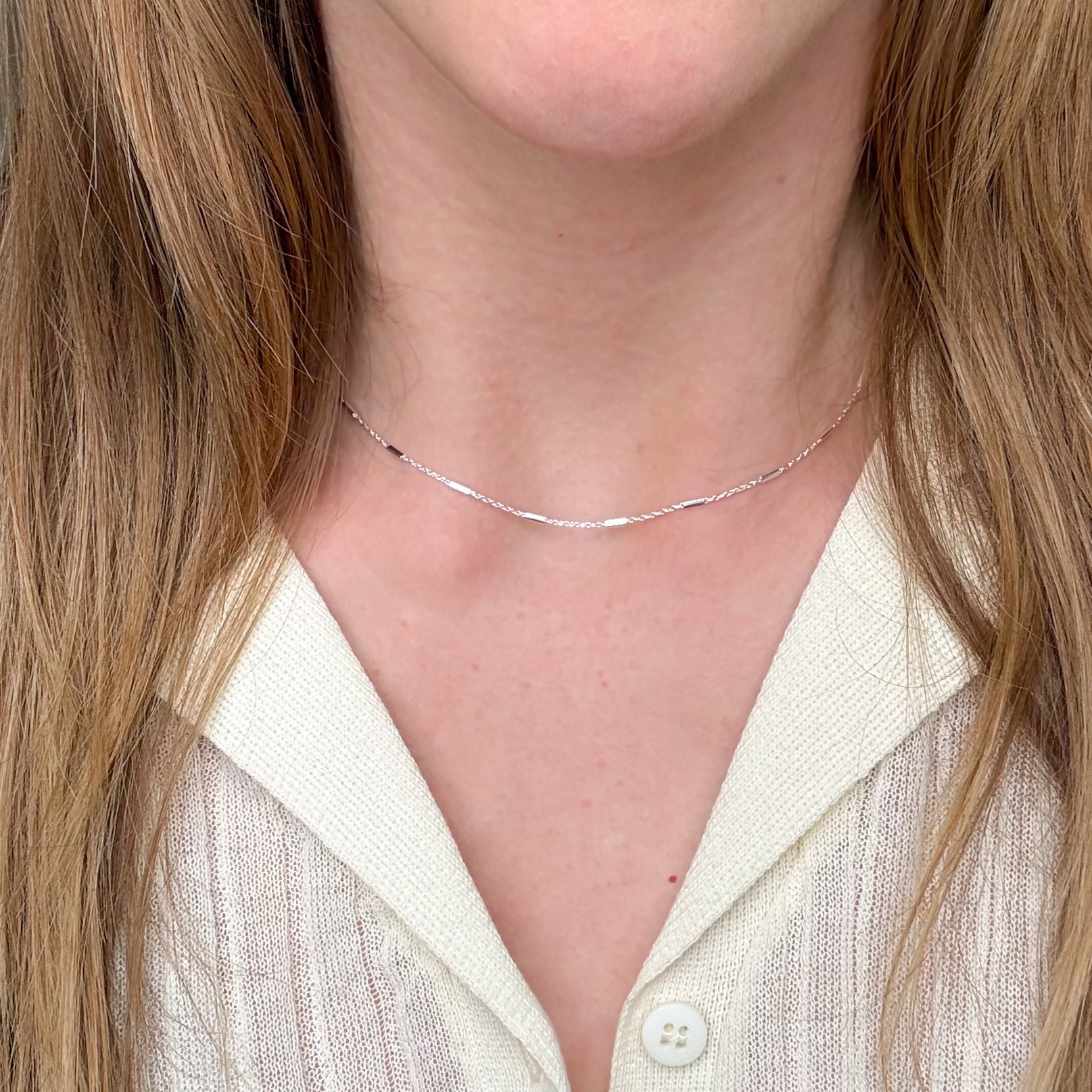 Vågring och kabel i silverfärgat set