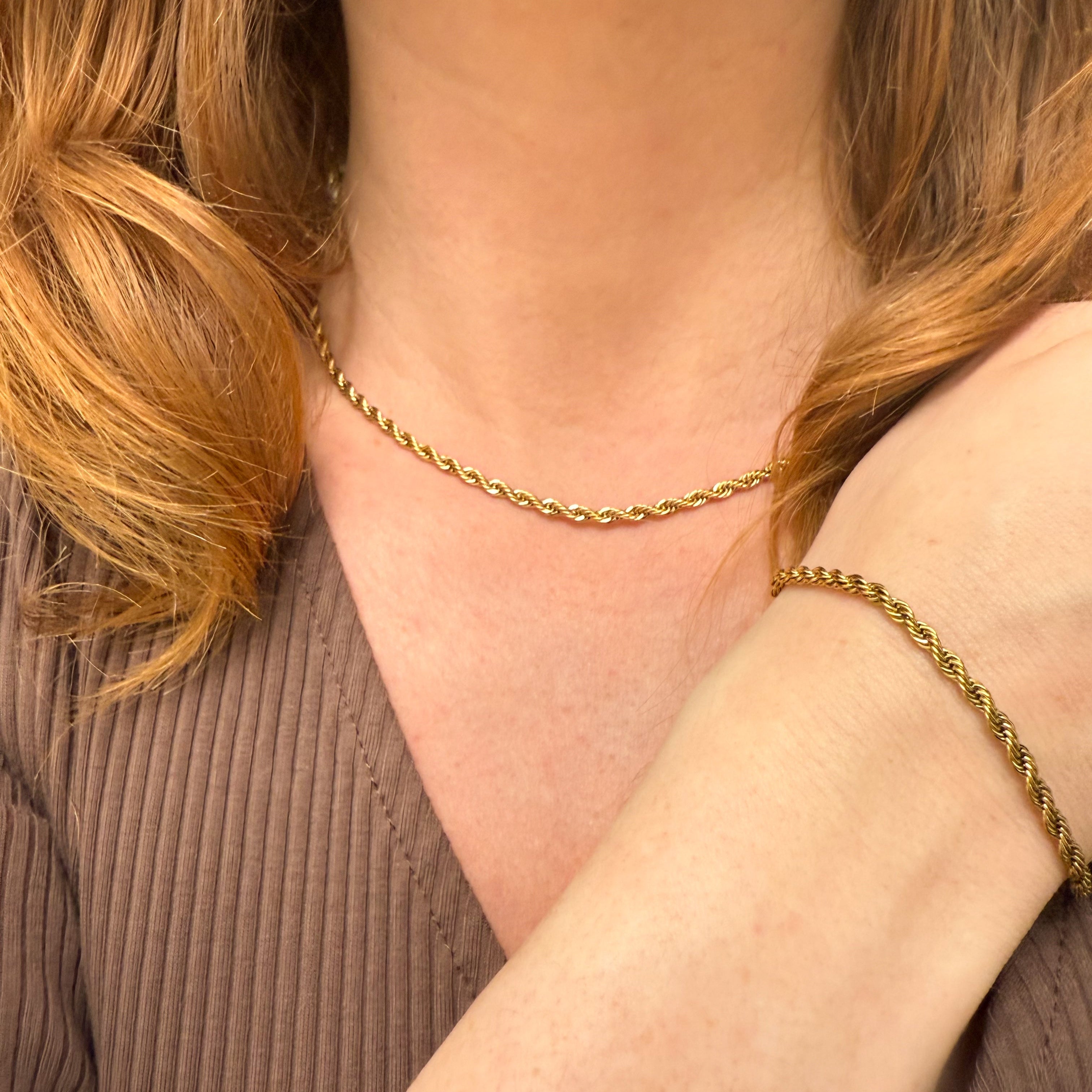 Tvinnat rephalsband förgyllt