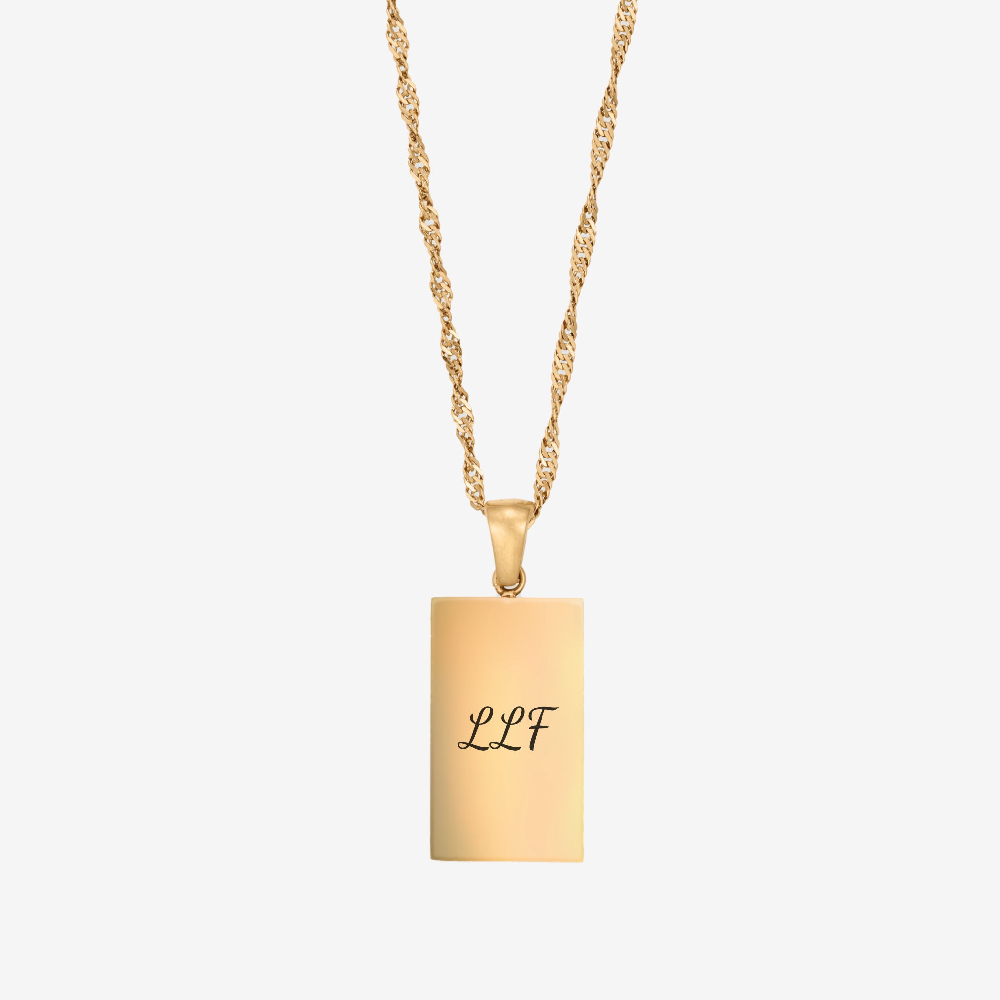 Halsband med graverade initialer