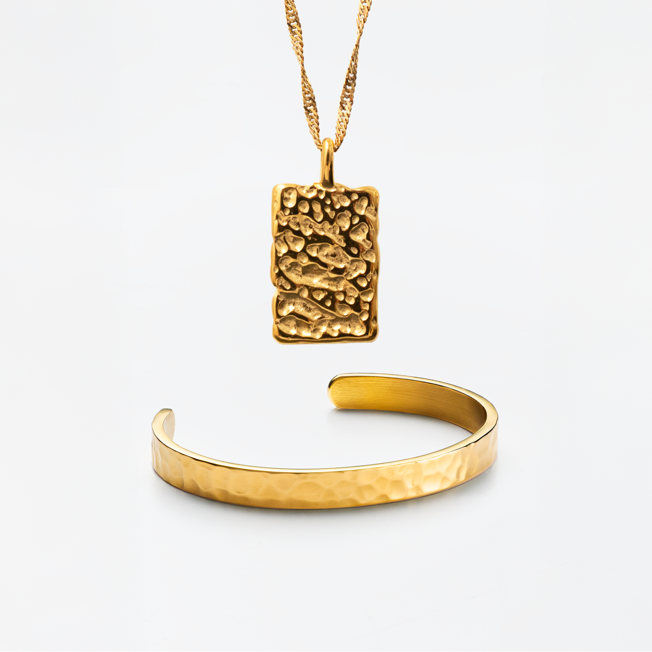 Hamrad guldpläterad uppsättning