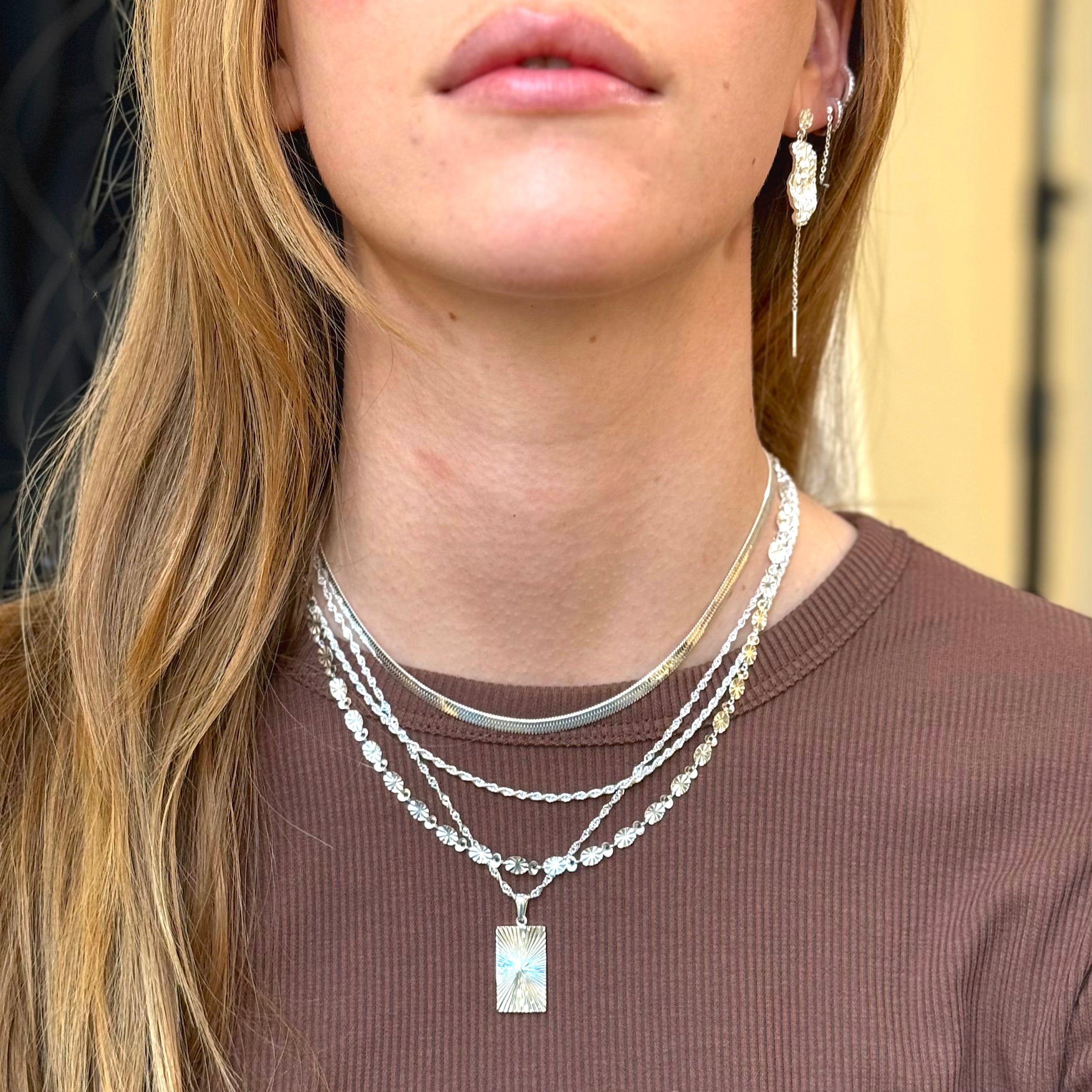 Solböjd stång silverset