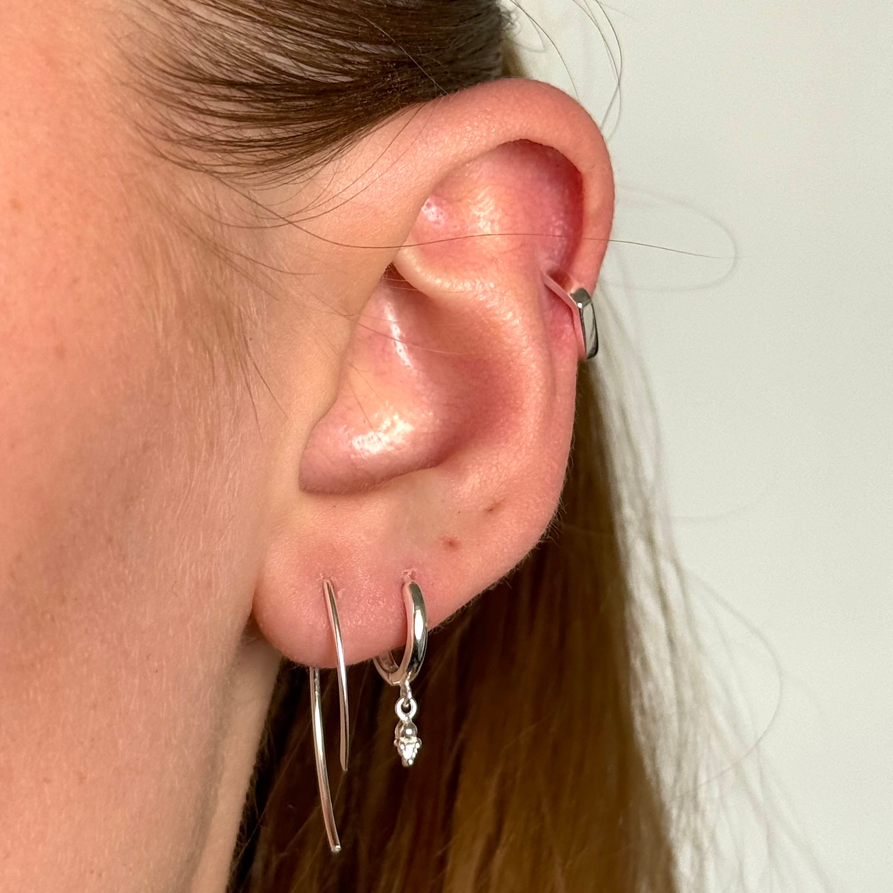 Solböjd stång silverset