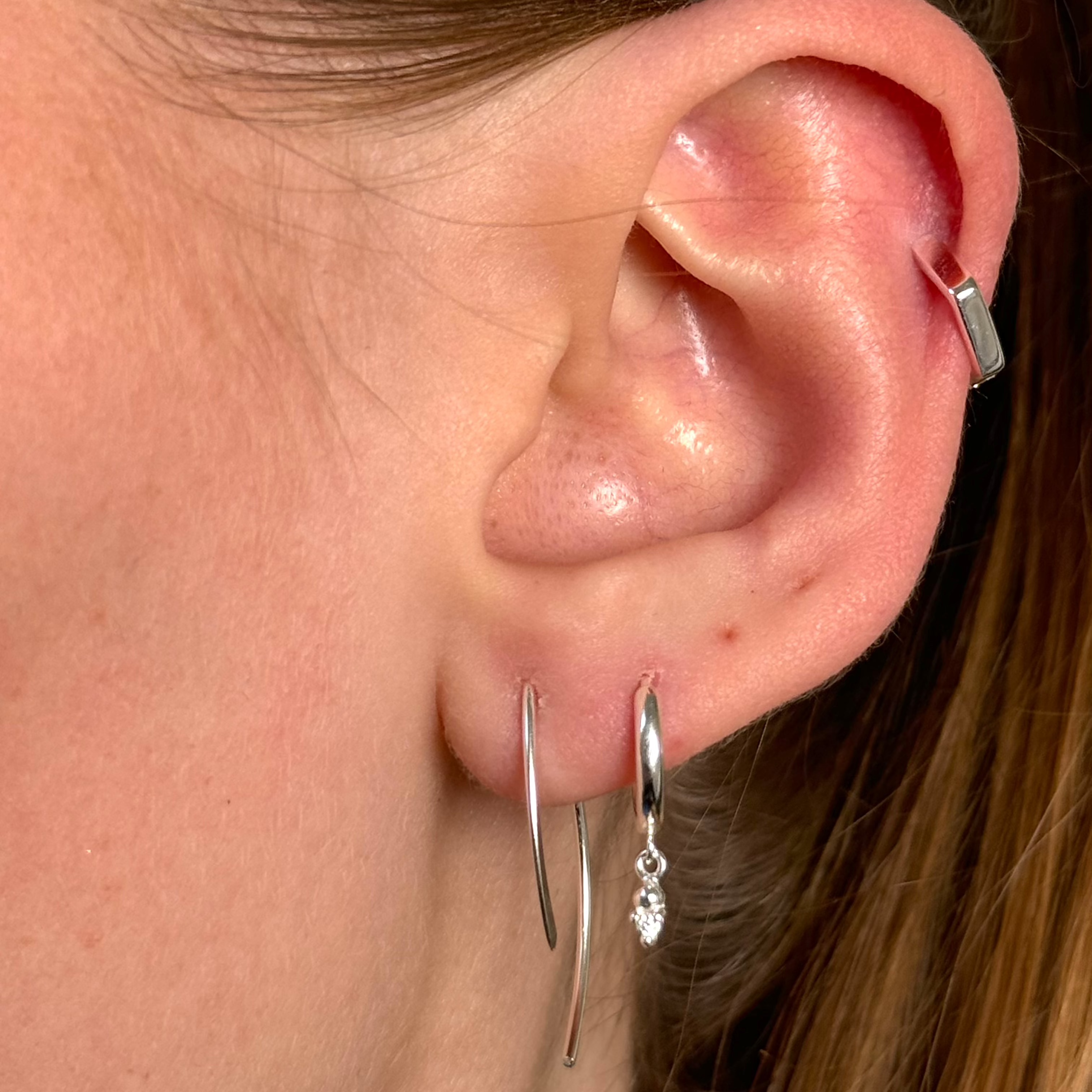 Solböjd stång silverset