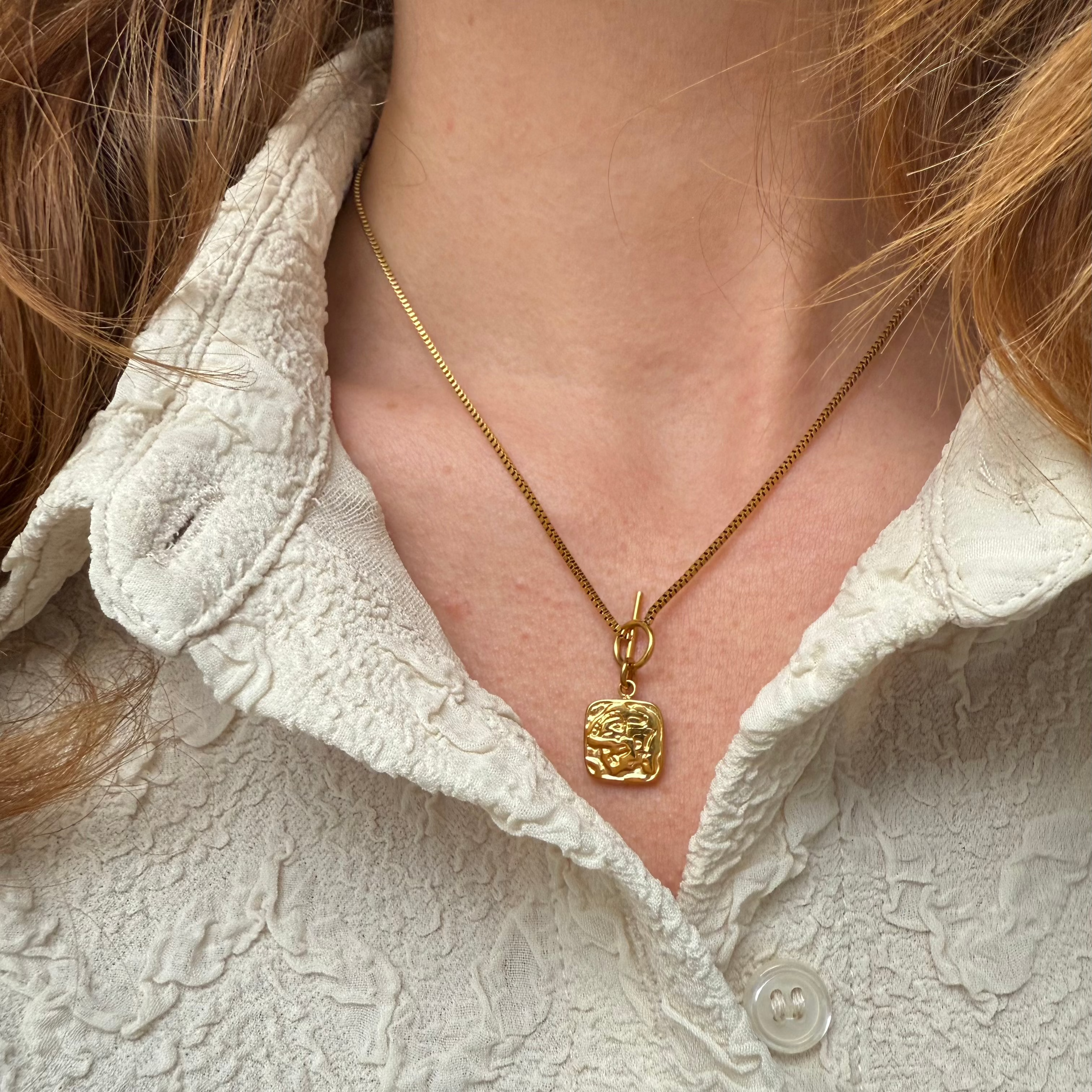 Halsband med stränglås