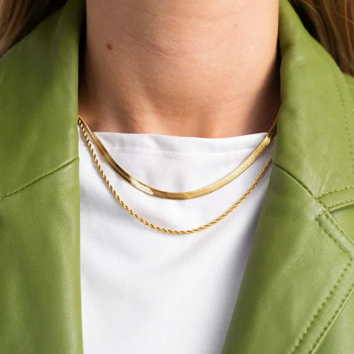 Dubbla halsband i guld och silver