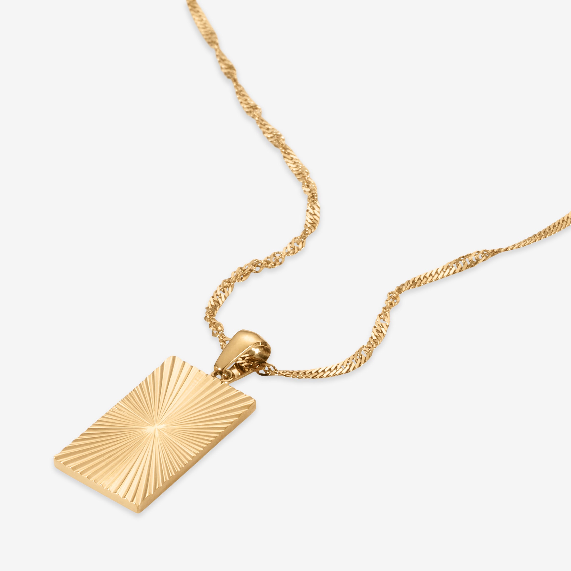 Halsband med graverade initialer