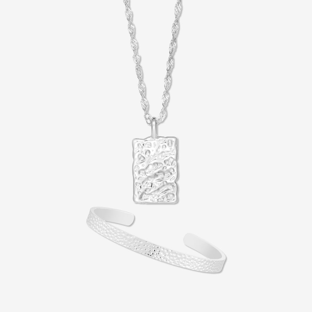 Hamrad silverpläterad uppsättning